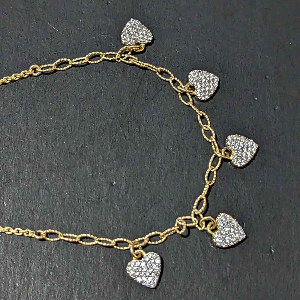 Yellow gold over sterling heart charm bracelet adjustable